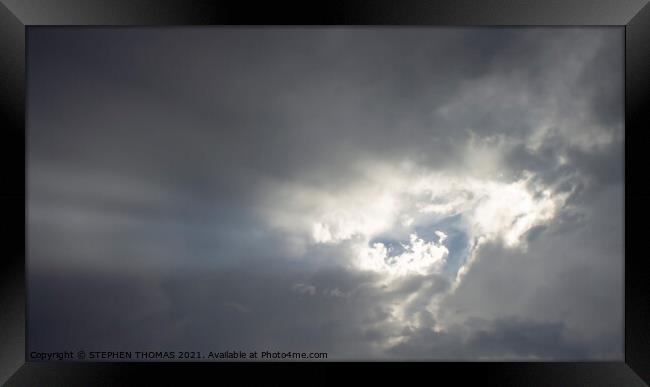 Hole In The Clouds Framed Print by STEPHEN THOMAS