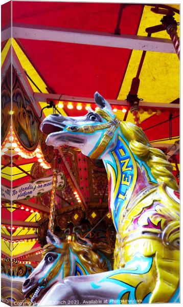 Fairground carousel Canvas Print by Cliff Kinch