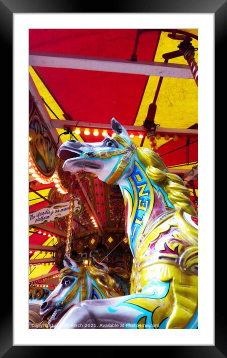 Fairground carousel Framed Mounted Print by Cliff Kinch