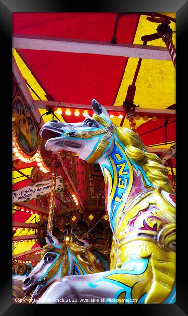 Fairground carousel Framed Print by Cliff Kinch