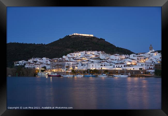 Sanlucar de Guadiana in Spain and Alcoutim in Portugal with sail boats on Guadiana river Framed Print by Luis Pina