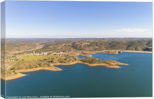 Aerial drone view of Barragem de Odeleite Dam reservoir in Alentejo, Portugal Canvas Print by Luis Pina