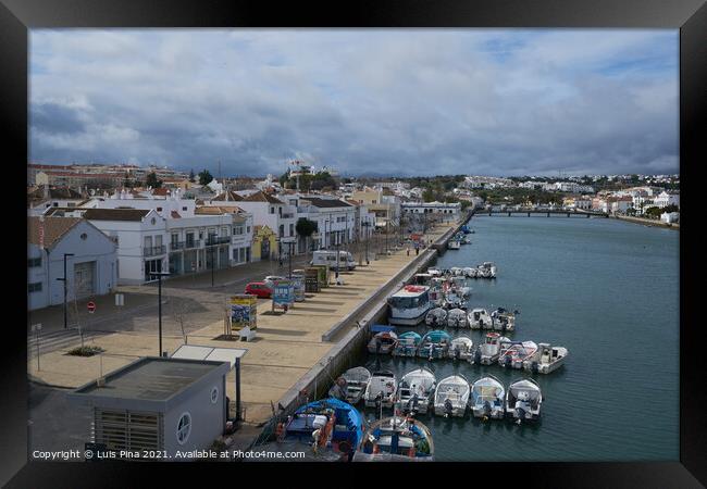 Tavira city view with boats in river gilao in Algarve, Portugal Framed Print by Luis Pina