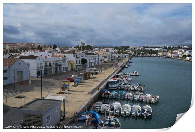 Tavira city view with boats in river gilao in Algarve, Portugal Print by Luis Pina