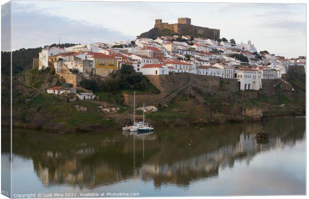 Mertola city view at sunset with Guadiana river in Alentejo, Portugal Canvas Print by Luis Pina