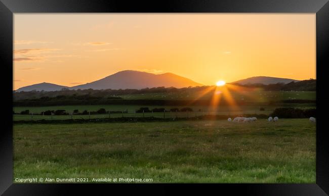 Sunset behind the Welsh Hills Framed Print by Alan Dunnett