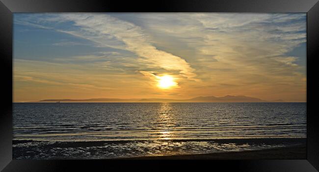Ayr beach, sun going down behind Arran Framed Print by Allan Durward Photography