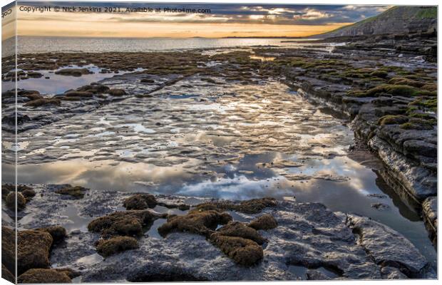 Cloud reflections seaside rock Dunraven Bay Canvas Print by Nick Jenkins