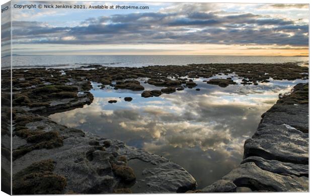 Rock Pool amazing cloud reflections Dunraven Bay Canvas Print by Nick Jenkins