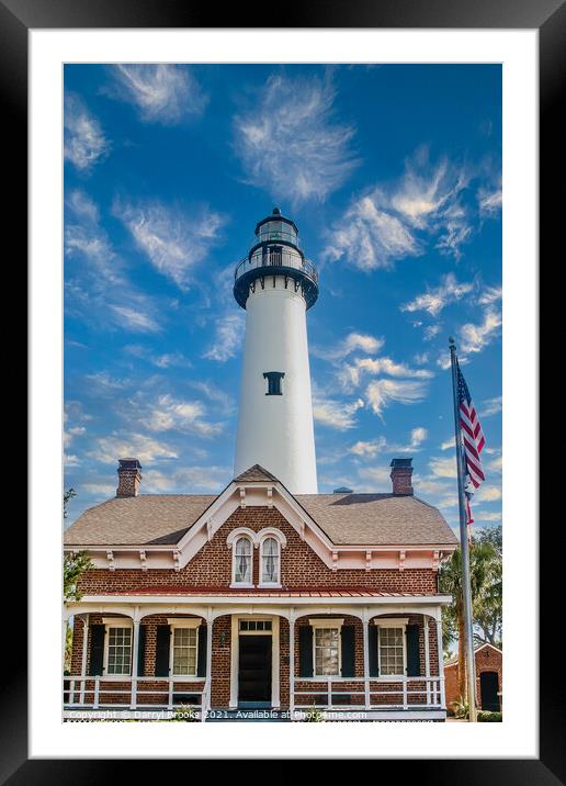 White Lighthouse Behind Brick House Framed Mounted Print by Darryl Brooks