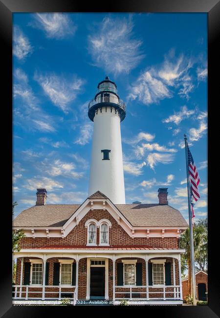 White Lighthouse Behind Brick House Framed Print by Darryl Brooks