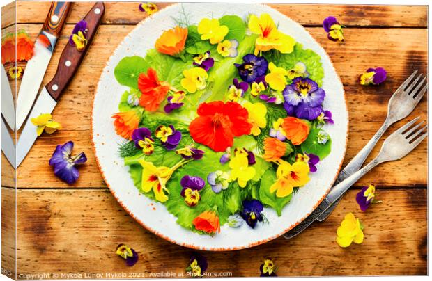 Spring salad with greens and edible flowers Canvas Print by Mykola Lunov Mykola