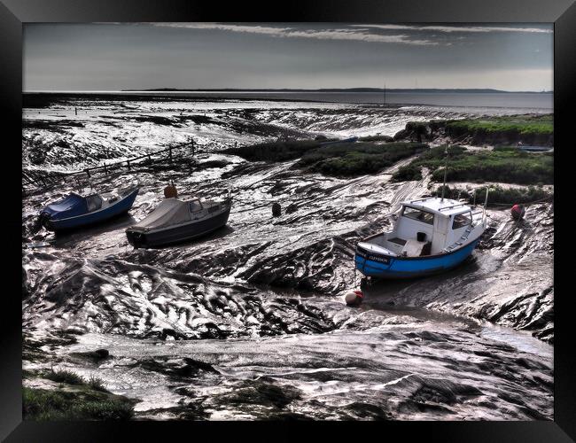 Fishing boats in harbour at low tide Framed Print by mark humpage