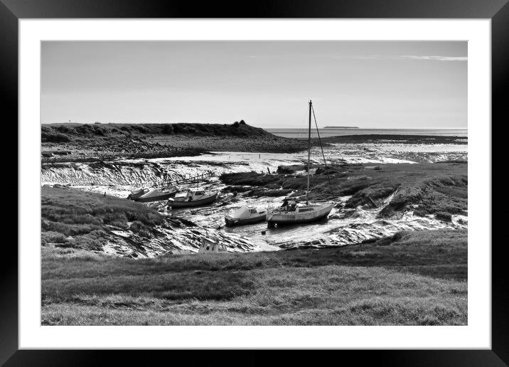 Boats in Clevedon harbour mud at low tide Framed Mounted Print by mark humpage