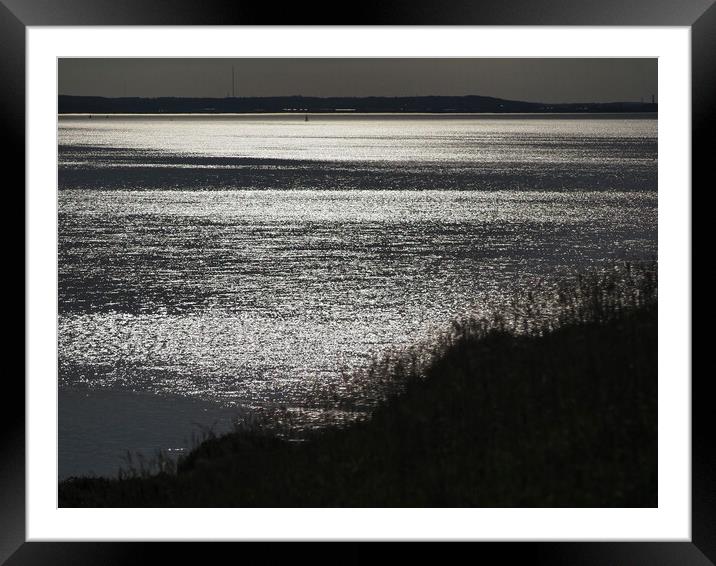 Sun setting over sea at Clevedon Somerset Framed Mounted Print by mark humpage