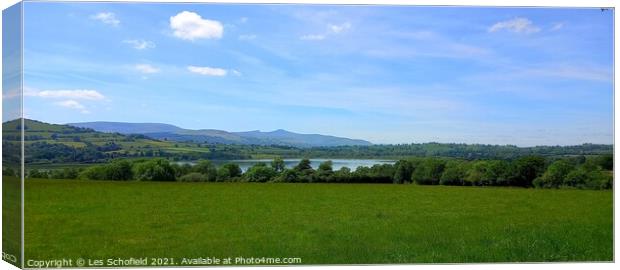 Llangors lake and the brecons Canvas Print by Les Schofield