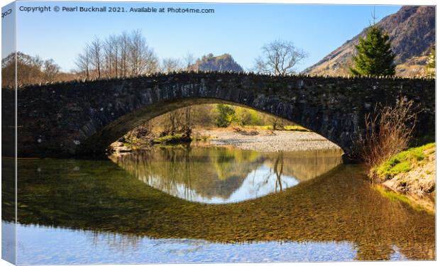 Grange Old Bridge Reflected in River Derwent Canvas Print by Pearl Bucknall