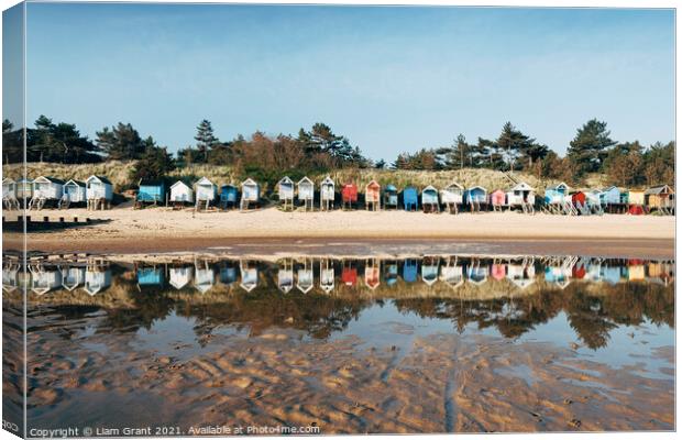 Beach huts. Wells-next-the-sea, Norfolk, UK. Canvas Print by Liam Grant
