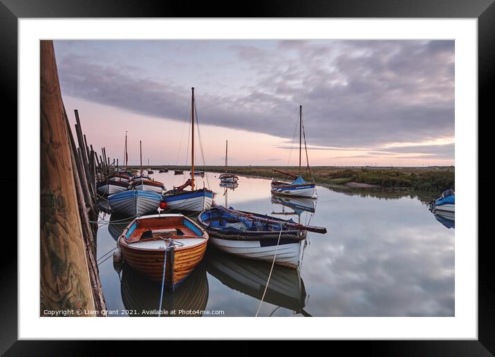 Boats moored in Blakeney Harbour at dawn. Norfolk, UK. Framed Mounted Print by Liam Grant