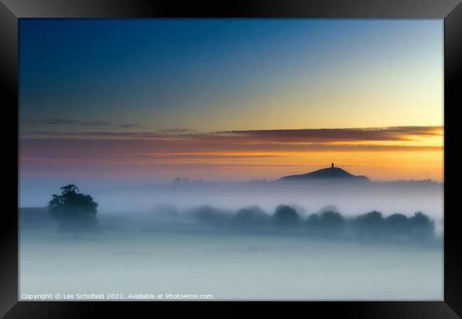 Majestic Sunrise Over Glastonbury Tor Framed Print by Les Schofield