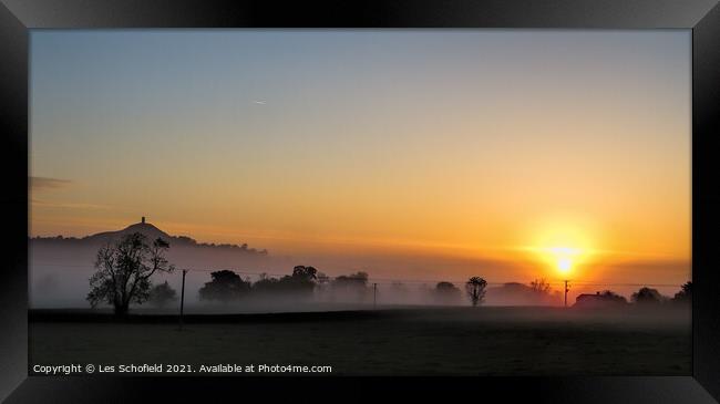 Majestic Sunrise over Glastonbury Tor Framed Print by Les Schofield