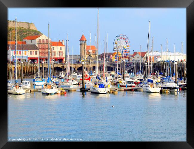Masts in the harbour. Framed Print by john hill