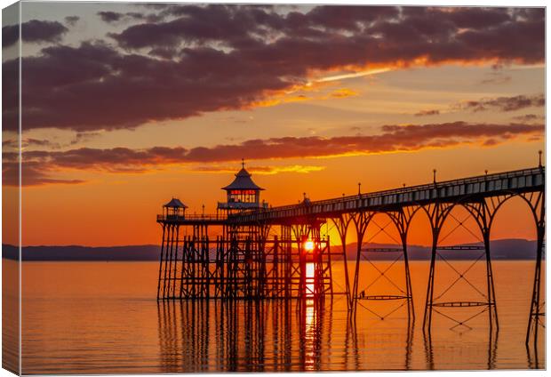 Clevedon Pier with a streak of sunlight Canvas Print by Rory Hailes
