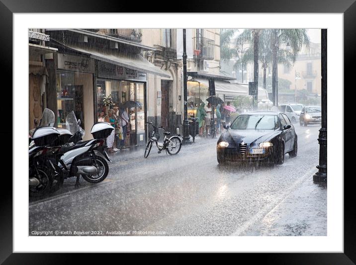 Heavy rain downpour in Sorrento, Italy Framed Mounted Print by Keith Bowser