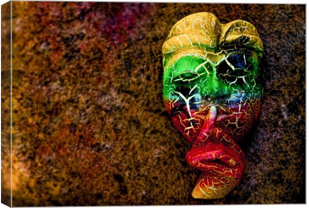 A Bali face mask with finger on its mouth. Canvas Print by Hanif Setiawan