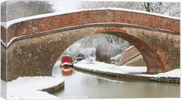Bridge 62 over Grand Union Canal in winter at Foxt Canvas Print by Keith Bowser