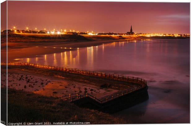 Old sea bathing pool and Tynemouth Church at night. Northumberla Canvas Print by Liam Grant
