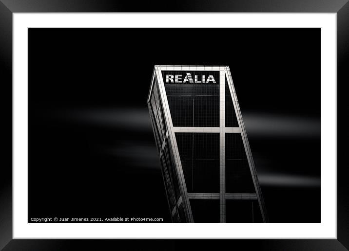 Realia skyscraper in Plaza de Castilla Square against sky Framed Mounted Print by Juan Jimenez