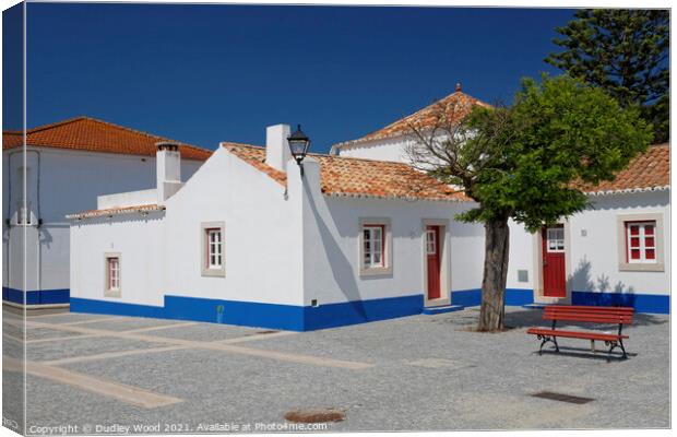 White Portuguese cottages with deep blue sky Canvas Print by Dudley Wood