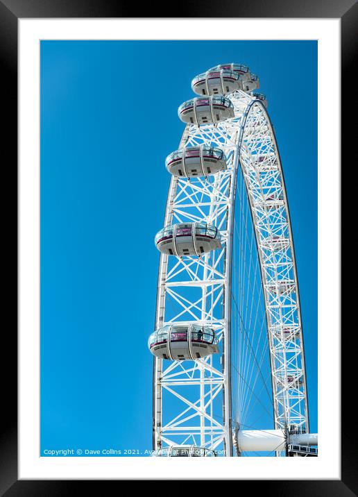 Capsules on the London Eye against a blue sky Framed Mounted Print by Dave Collins