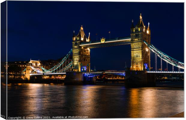 Illuminated Tower Bridge over the River Thames at Dusk Canvas Print by Dave Collins