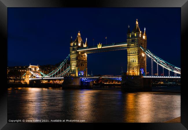 Illuminated Tower Bridge over the River Thames at Dusk Framed Print by Dave Collins