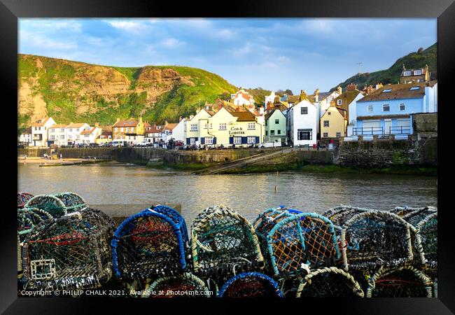 Staithes sea front with the cod and lobster pub with lobster pots. 538 Framed Print by PHILIP CHALK