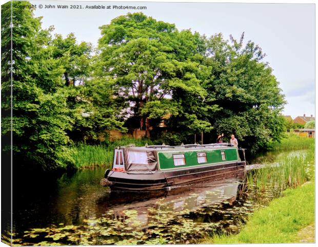 On the Canal Canvas Print by John Wain