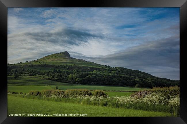 Roseberry Topping under the morning Clouds Framed Print by Richard Perks