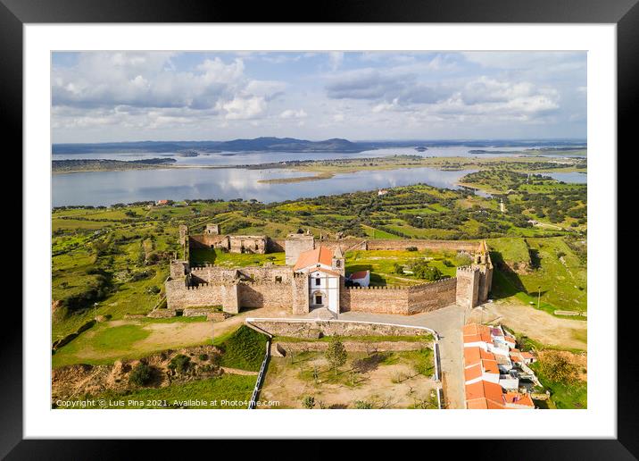 Mourao drone aerial view of castle with alqueva dam lake behind in Alentejo, Portugal Framed Mounted Print by Luis Pina