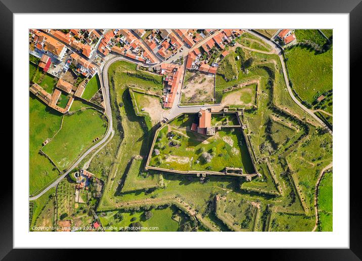 Mourao drone aerial top view of star shapped castle with alqueva dam lake behind in Alentejo, Portugal Framed Mounted Print by Luis Pina