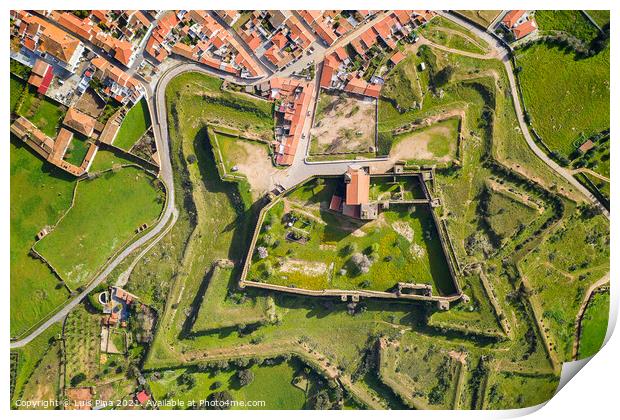Mourao drone aerial top view of star shapped castle with alqueva dam lake behind in Alentejo, Portugal Print by Luis Pina