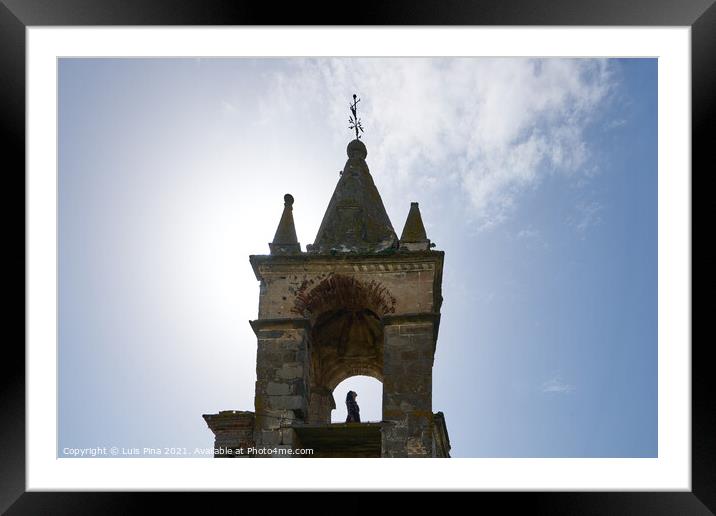 Woman girl traveler inside the Mourao castle tower with blue sky on the background in Alentejo, Portugal Framed Mounted Print by Luis Pina