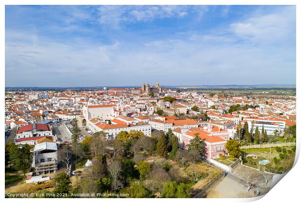 Evora drone aerial view on a sunny day with historic buildings city center and church in Alentejo, Portugal Print by Luis Pina
