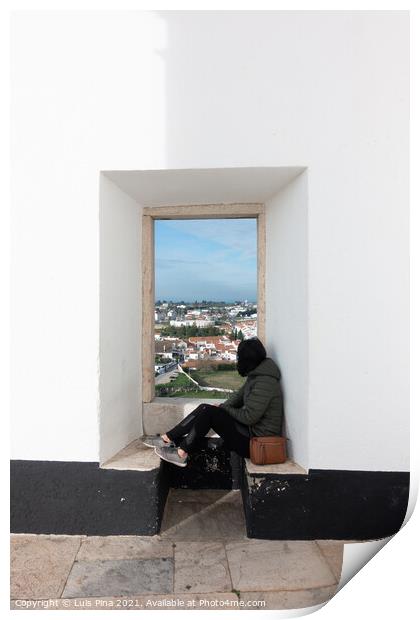 Woman girl traveler sit and looking through a white wall window Estremoz city and Alentejo landscape, in Portugal Print by Luis Pina