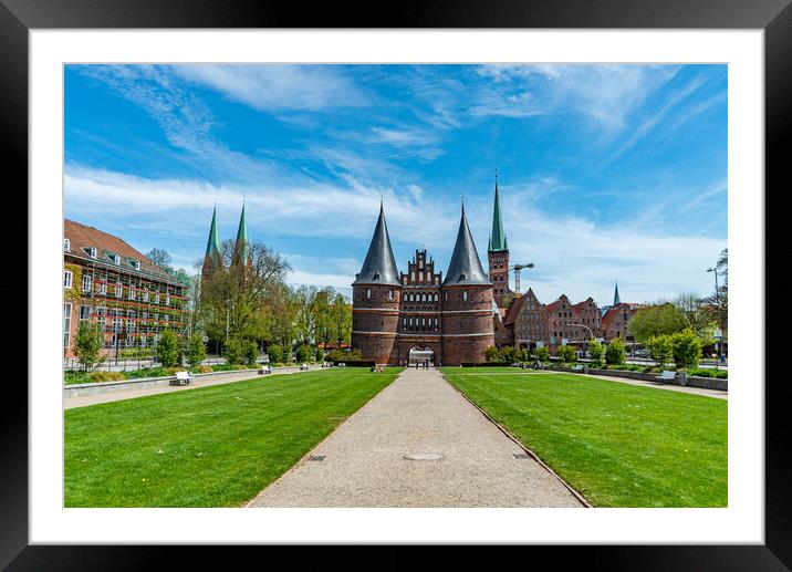 Famous Holsten Gate in the city of Lubeck Germany - CITY OF LUBECK, GERMANY - MAY 10, 2021 Framed Mounted Print by Erik Lattwein