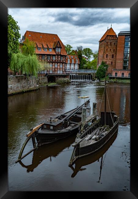 Beautiful old buildings in the historic city of Luneburg Germany - CITY OF LUENEBURG, GERMANY - MAY 10, 2021 Framed Print by Erik Lattwein