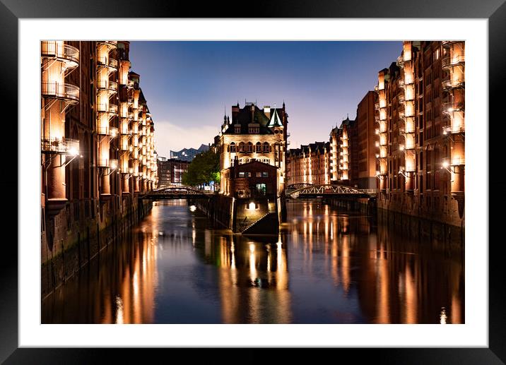 Historic warehouse district in the city of Hamburg by night - CITY OF HAMBURG, GERMANY - MAY 10, 2021 Framed Mounted Print by Erik Lattwein