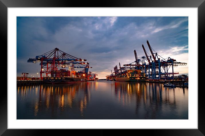 Port of Hamburg in the evening in the back light - CITY OF HAMBURG, GERMANY - MAY 10, 2021 Framed Mounted Print by Erik Lattwein