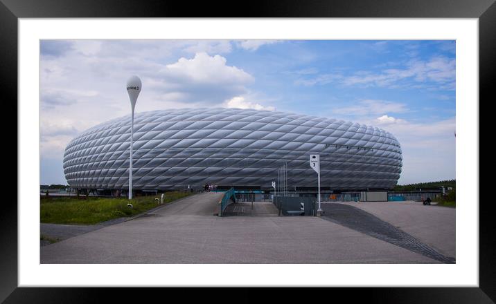 Famous Allianz Arena stadium in Munich - Home of famous soccer club FC Bayern Muenchen - MUNICH, GERMANY - JUNE 03, 2021 - CITY OF MUNICH, GERMANY - JUNE 03, 2021 Framed Mounted Print by Erik Lattwein